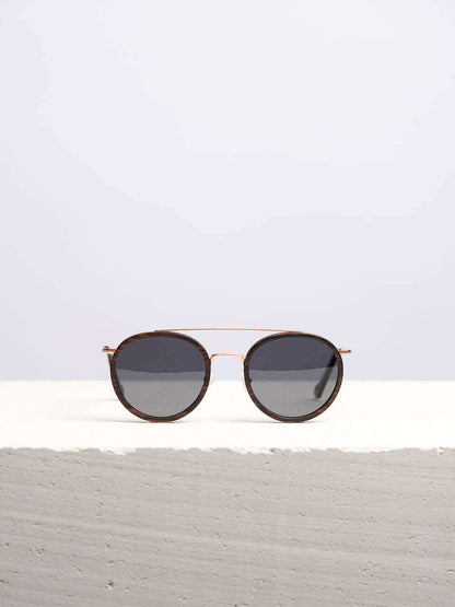 Stylish Wooden Sunglasses kept on a white table