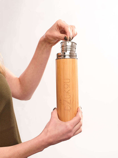  Girl holding a Thermos Bottle